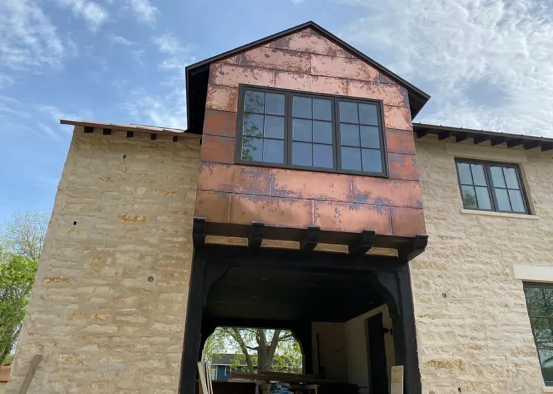 Copper metal panel facade on a stone building for Metal Roof Coating in Coral Gables
